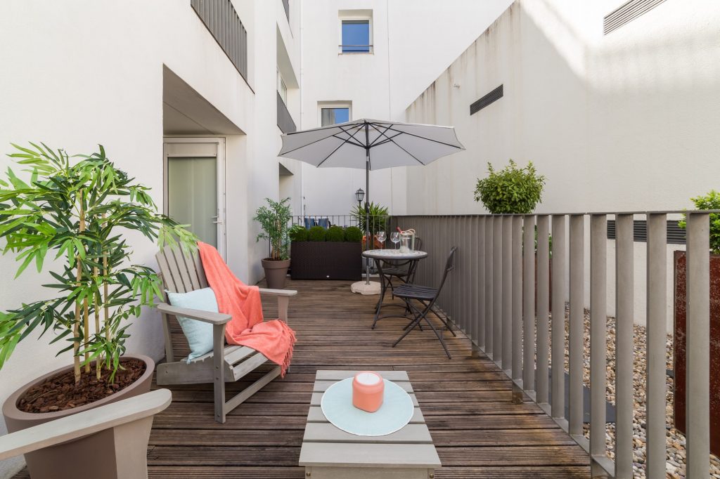 Small balcony in middle of apartment complex